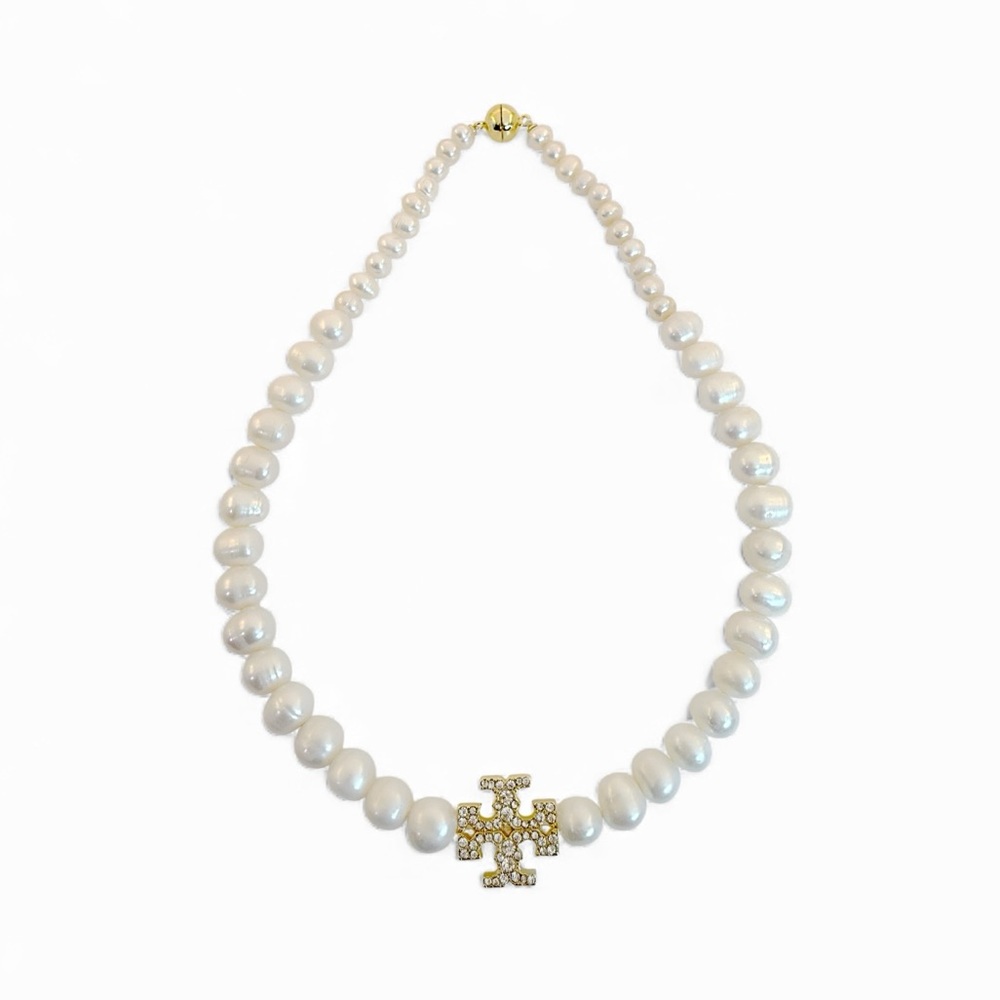 Tory Burch Moondance Pearl Pave Necklace in gold.
